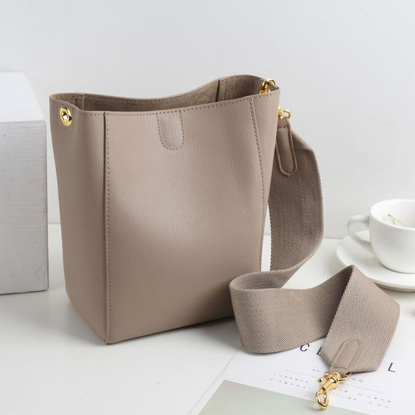 

70% off design hand korean fashion wide shoulder belt bucket women's leather large capacity cowhide bag trend one shoulder messenger ba