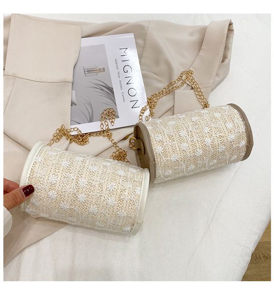 

new handbags cylindrical female 2021 popular lace shoulder summer vacation grass woven ins chain messenger bag factory direct sale