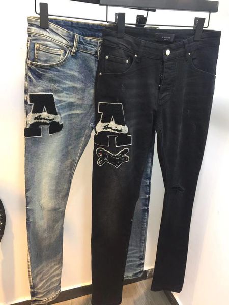 Jeans da uomo Foro per il ginocchio Nuovo designer Strappato dritto Moto lavato Biker Industria pesante Pantaloni tie-dye Per uomo Felpa con cappuccio da donna Pantaloni in denim di marca famosa di alta qualità