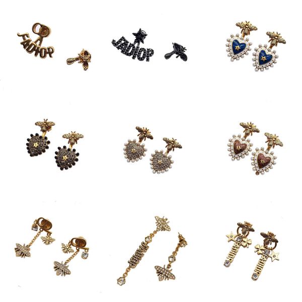 

designer jewelry family's new bee asymmetric earrings, Silver
