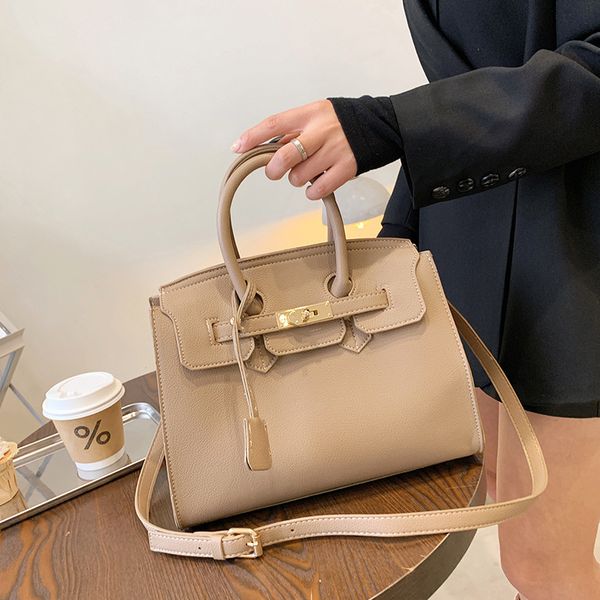 

one shoulder hand-held leather tote women's large capacity bag