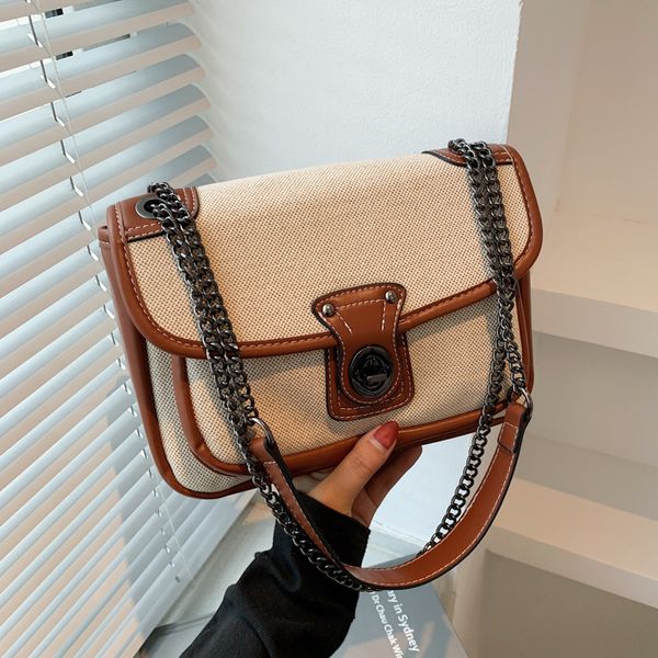 

french style canvas stitching leather 2021 autumn new saddle bag womens western style chain stray bag shoulder messenger bag wholesale