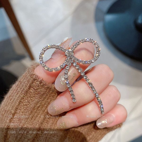 

simple fashionable design with diamond bow earclip cool wind east gate net red temperament personalized earrings and earrings, Silver