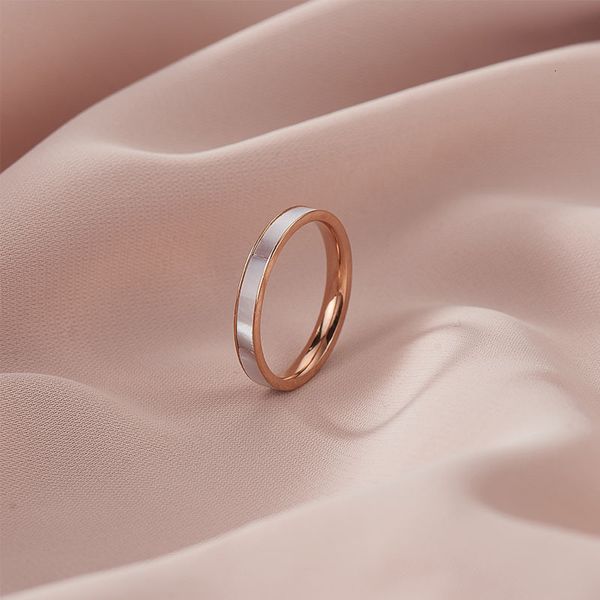 

japan and south korea fashion simple titanium steel female white shell does not drop pigment ring, Silver