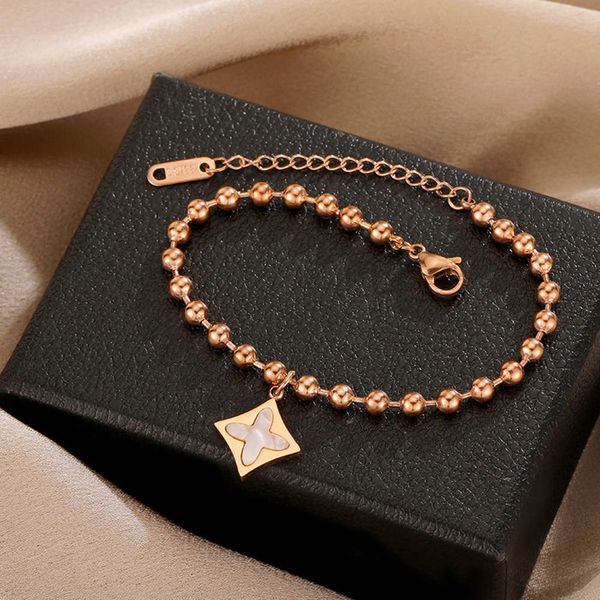 

white shell clover bracelet rose gold titanium steel beaded, Black