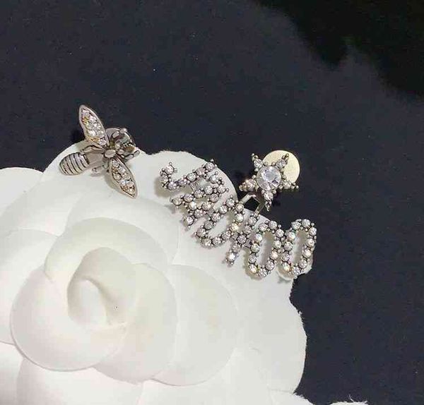 

female fashion luxury designer jewelry d letter asymmetric simple bee five pointed earrings star brass 925 silver needle material, Red;brown