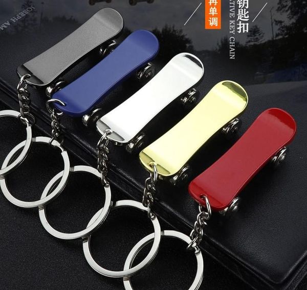 

keychains wholesale 20pcs creative keychain mini metal skateboard pendant ring gifts, Silver