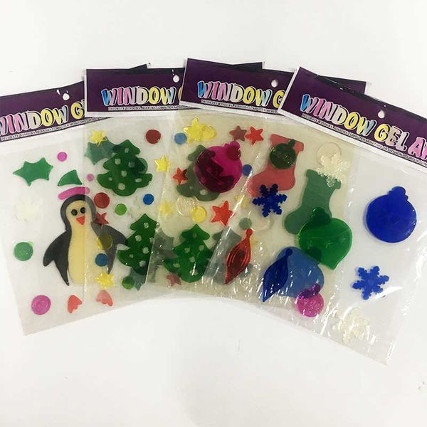 

decorating jelly, sticking christmas tree, snowflake, old window, fridge, sticker, and gel.
