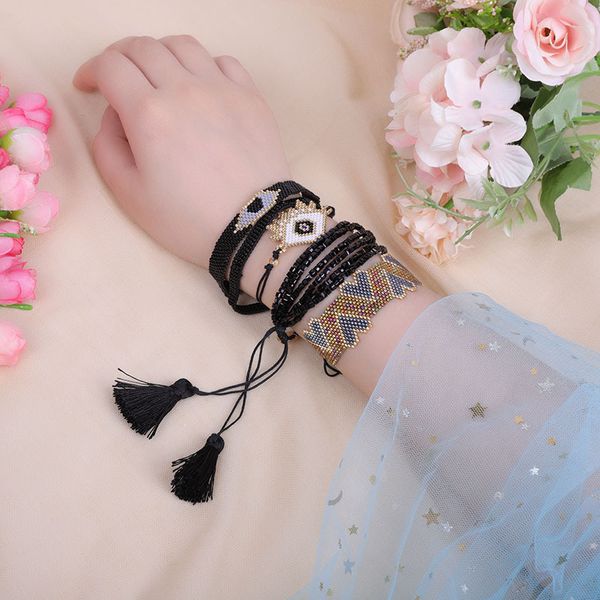 Uva moda etnica intrecciata a mano multicolore turco Miyuki Bead Evils Eye nappa ragazza braccialetto di corda regolabile