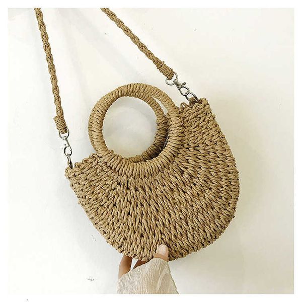 

hbp non-brand paper rope fashion versatile portable messenger small round bucket hand woven straw bag women 2 sport.0018