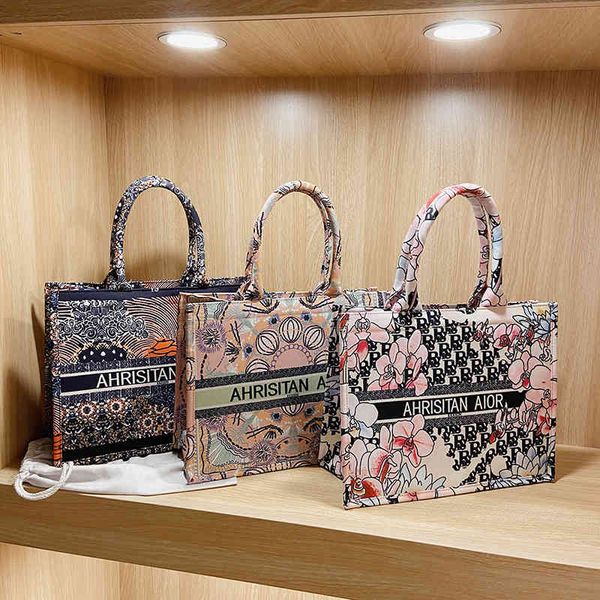 

2022 factory wholesale new sense of foreign style women's portable tote bag canvas printing fashion large capacity one shoulder shoppin
