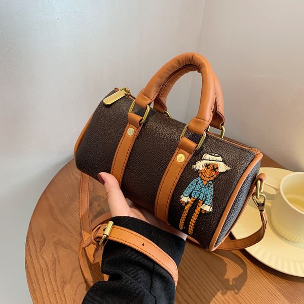 

niche design cylinder women's 2021 new fashion messenger bag high sense portable boston bag