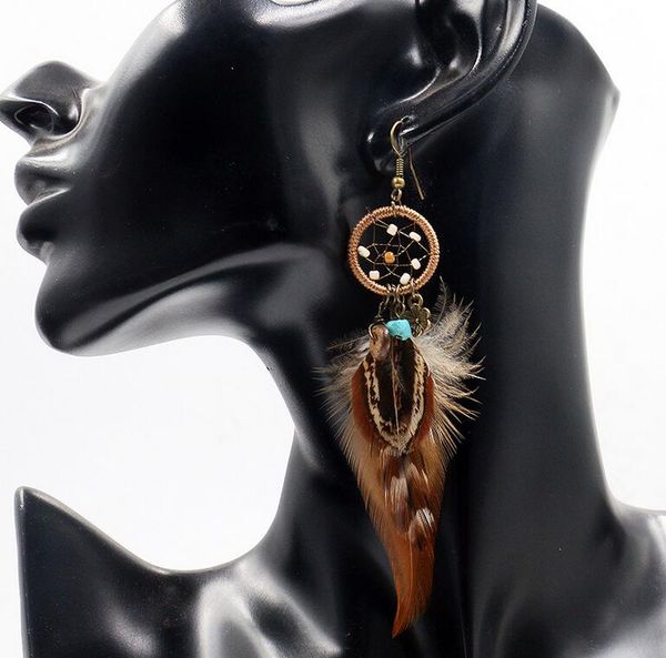 Orecchini pendenti romantici Dreamcatcher del vento nazionale per le donne Orecchini pendenti con piume Gioielli di moda unici ed eleganti