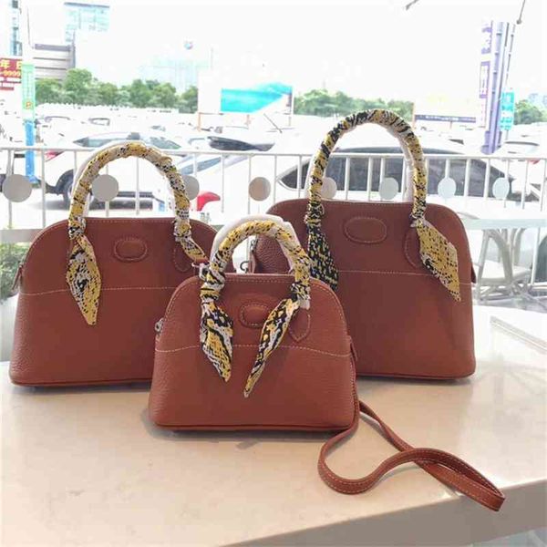 

women luxurys designers bags 2021 factory shell lychee grain head layer, one slanting designer handbag handbags totes crossbody bag