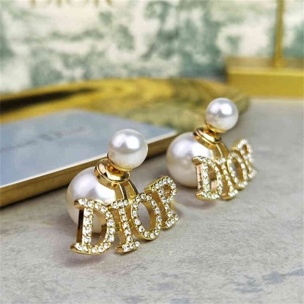 

87% off wholesale shop home size pearl color diamond earrings new high version red silver needle earrings, Golden