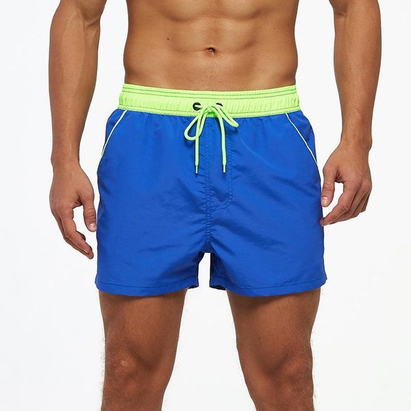 

men's shorts beach quick-drying solid color pants triangle mesh lined swimming trunks european and american surf, White;black