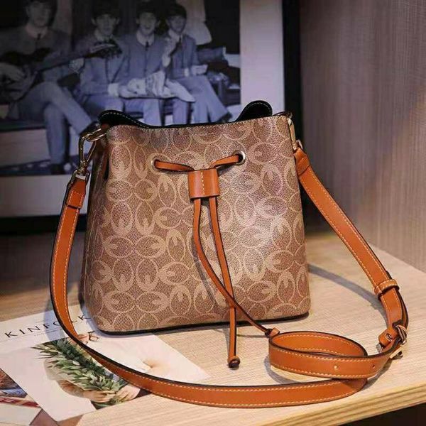 

american guanchi genuine women's new leather drawstring bucket printing portable one shoulder messenger bag