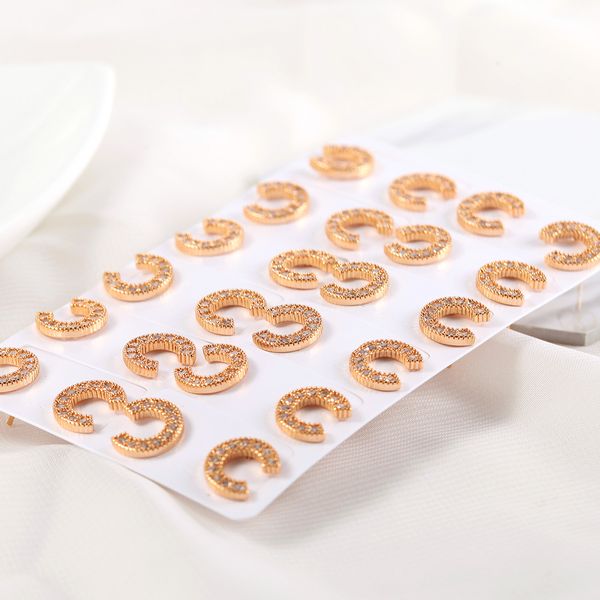 

stylish, modern studs, rose gold c stud, Golden;silver