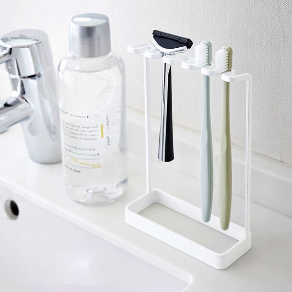 

toilet vertical hole mouthwash bathroom razor toothbrush storage rack