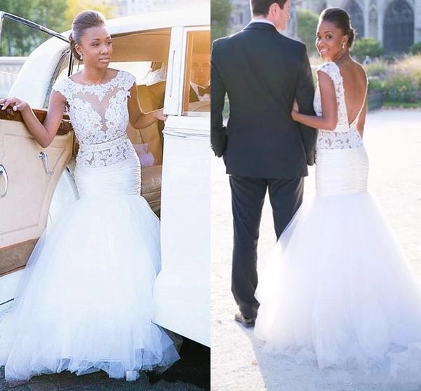 

unique see through mermaid wedding dress 2022 crystal beaded lace cap short sleeves appliquetulle south arabic country designer african cour, White