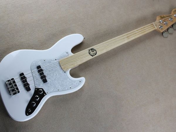 

4 string non-quality electric bass white body maple fingerboard with pattern
