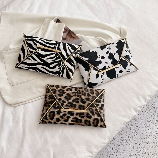 

50pcs stuff sacks women pu leopard cow prints hasp envelope bag mix color