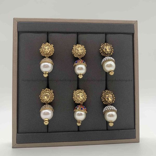 

design jewelry 2021 new bronze lion head double color diamond pearl rhinestone personalized earrings, Golden