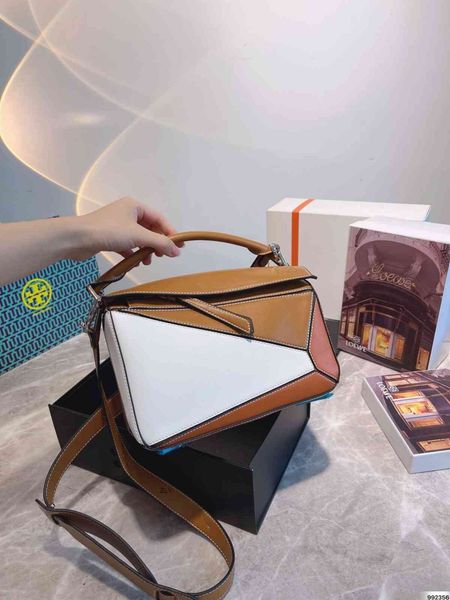 

2021 new leather cowhide rhombic geometric bag color matching pillow large capacity versatile hand messengerzlyzly