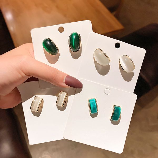 

genuine gold electroplating 925 silver needle cat's eye stone earrings cold wind earrings french simple temperament earrings