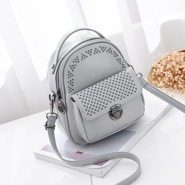 

backpack 2021 pu rivet small shoulder bag student fashion