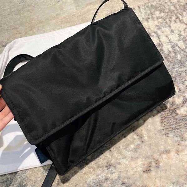 

who said that girls can't carry p-type postman bags on the street