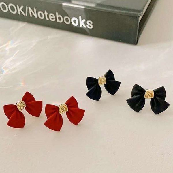 

s925 silver needle advanced sense hepburn bow simple women's small cool style earrings, Black
