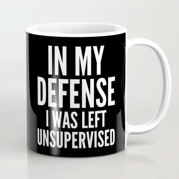 

mugs in my defense i was left unsupervised (black & white) coffee mug