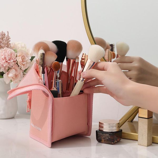 

women's cosmetic bag round bucket opening waterproof eyebrow pencil case in hand tidying and storing makeup bags & cases