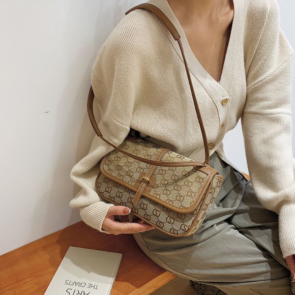 

luxury design canvas bag women's new fashion texture commuter single shoulder armpit large capacity tote bag purses