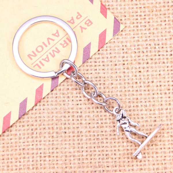 

20pcs fashion keychain 21x18mm lady female surfer surfing pendants diy men jewelry car key chain souvenir for gift, Slivery;golden