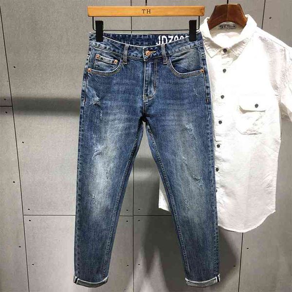

spring and summer blue jeans men's fashion brand casual comfortable trend small foot stretch slim pants