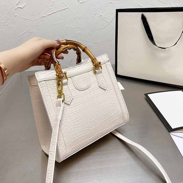 

handbag women luxurys designers bag 2021 shoulder bags tote canvas leather vintage totes fashion letter hasp hardware bamboo handle ajustabl