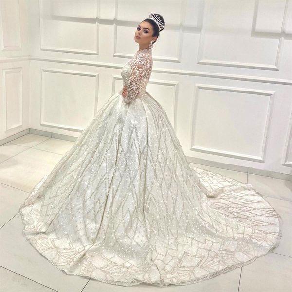 

dubai luxurious ball gown glittering wedding dresses sequin bridal gowns 2022 sheer long sleeve lace up vintage vestido de novia, White
