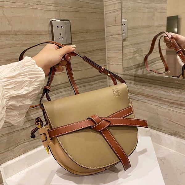 

2021 new saddle women's bag messenger fashion leisure bow handbag zly
