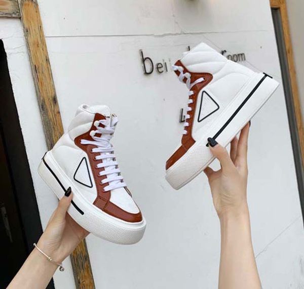 

fashion luxury men women sneakers designer shoes high help nylon gabardine sneaker has thick rubber sole ariangular logo adorns the sides si, Black