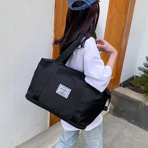 

duffel bags large capacity folding travel bag female fitness waterproof sports handbag women's hand luggage business