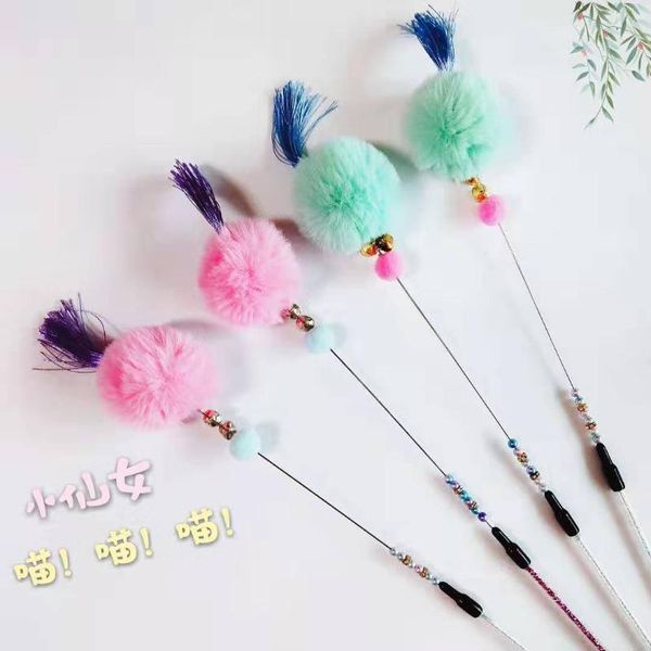 

cat toys tassel, fur ball, fairy, stick, bell, feather, pet item, toy