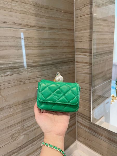 

the new pearl wallet of 2021, the mouth red envelope temperament dinner small bags can be one shoulder slanting across high-end material sup