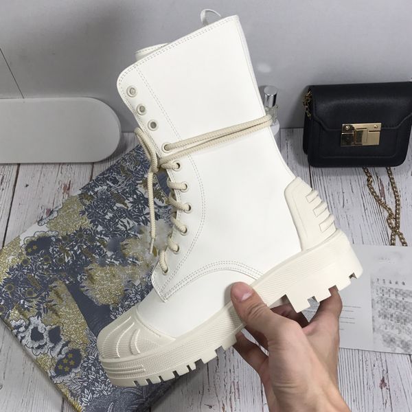 

women designer major ankle boot is offered in a military inspired variation the balck fabric and leather, Black