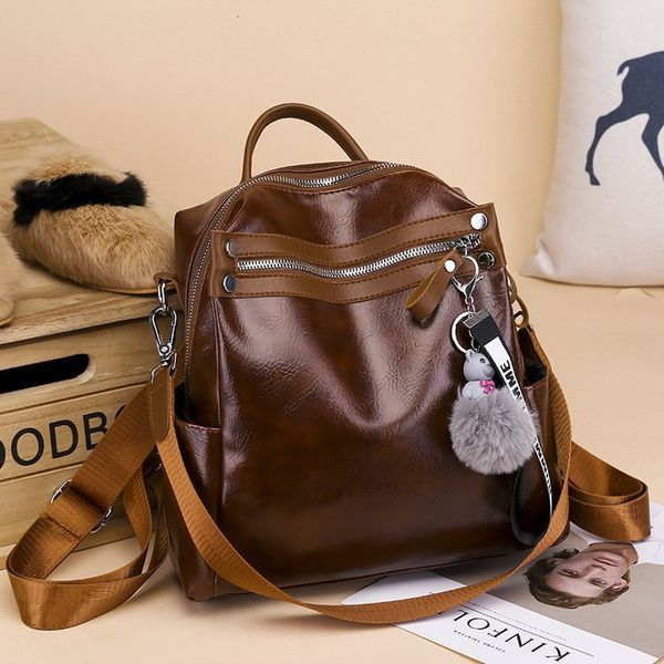 

backpack style with high-end temperament japanese and korean fur ball bear pendant women's bag 6991