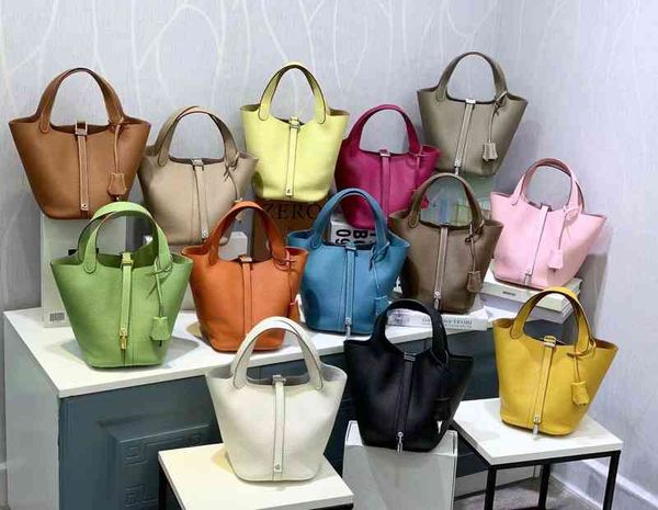

brand h handbags 2022 new leather hand basket bucket layer cowhide litchi fringe