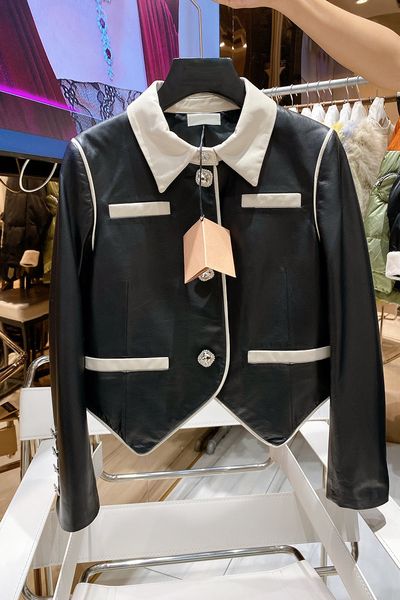 

autumn new black and white contrast imitation leather lapel short motorcycle jacket