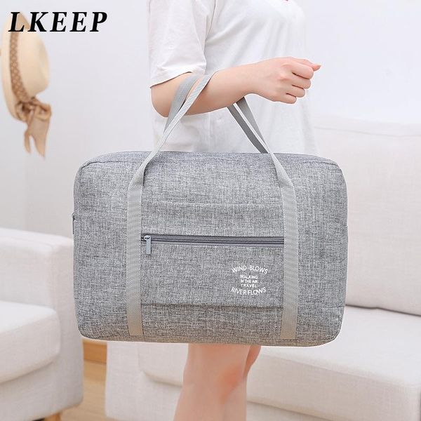 

duffel bags fashion waterproof travel bag large capacit women folding men luggage handbags oxford cloth