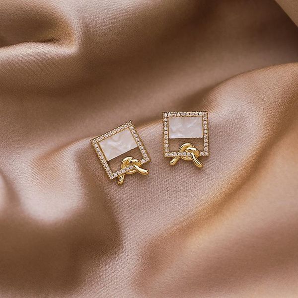 

stud 2021 arrival trendy square zircon shell knotting earrings for women elegant geometric crystal jewelry, Golden;silver